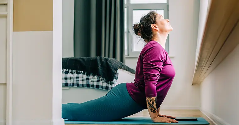 Mid-adult woman doing yoga