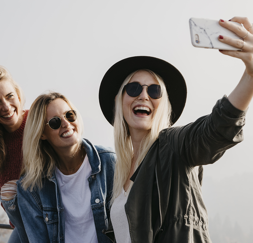 Three young women taking a selfie